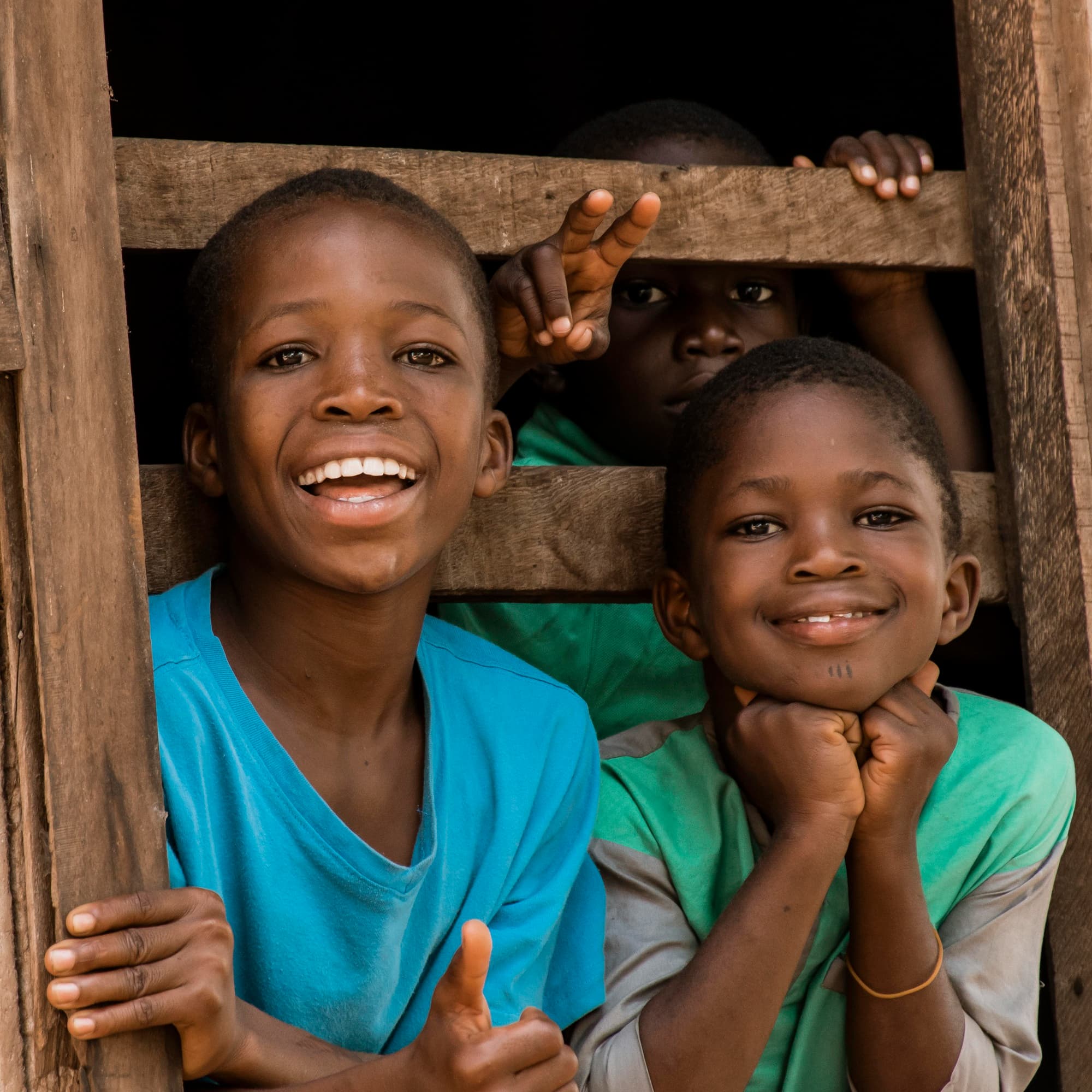 Children smiling together outdoors