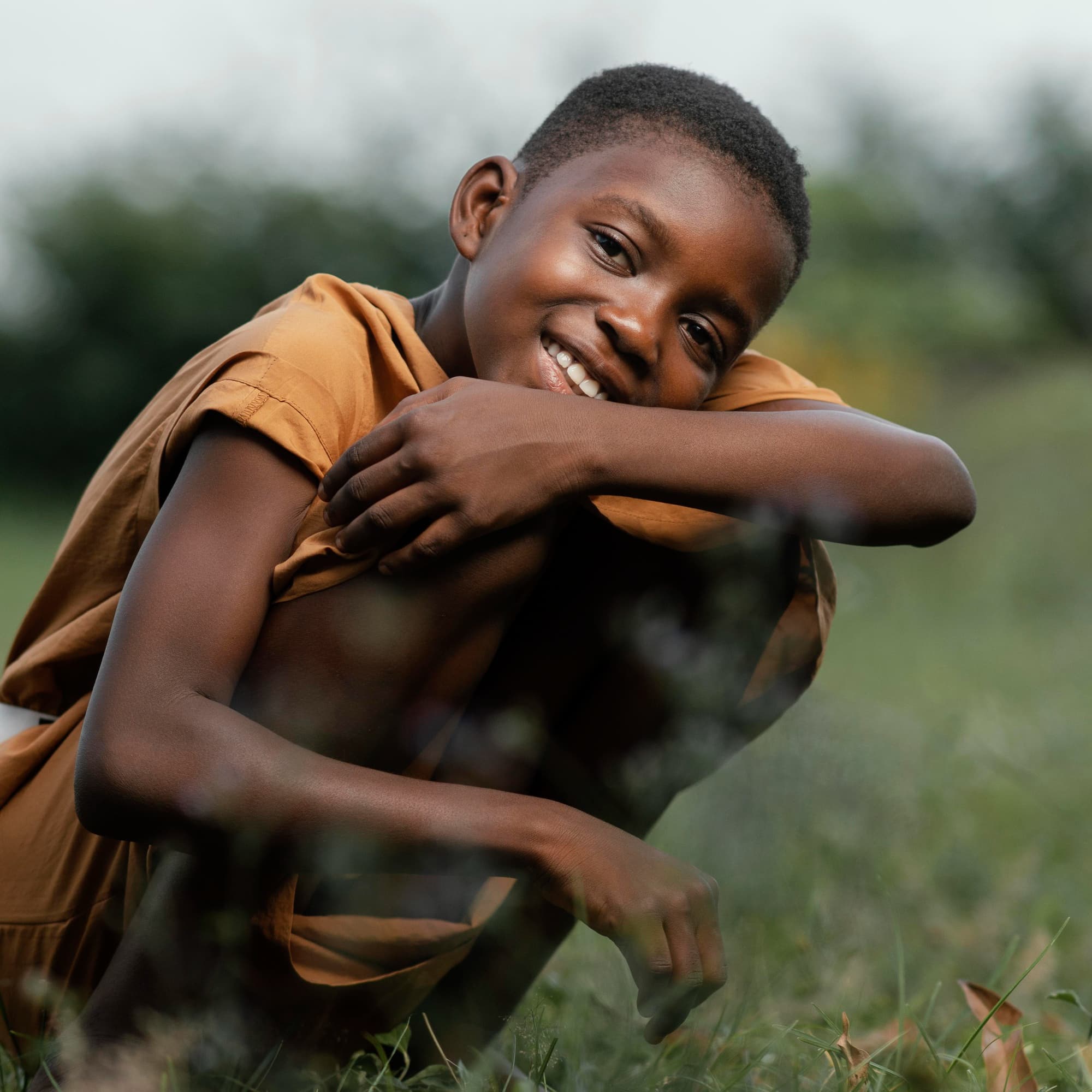 Smiling African child representing hope and impact